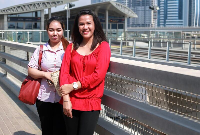 Tourists Jenny Rebizo, 22, and Mary Ann Banla, 27, are happy to public transport to get around Dubai. Victor Besa for The National