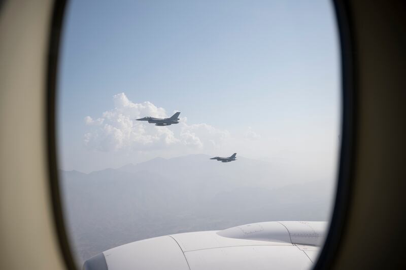 Jets from the Royal Air Force of Oman fly alongside the UAE's Presidential Plane. Photo: UAE Presidential Court