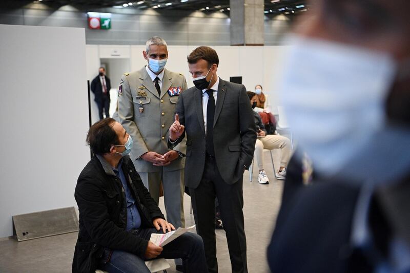 French President Emmanuel Macron visits a vaccination center during its inauguration at Porte de Versailles convention centre in Paris, France. EPA