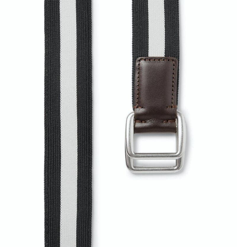 This black and white stripe belt is both relaxed and sophisticated. It’s all in the details: we love the dark brown leather trimming and the silver double ring fastening; Moncler, Dh845 on MrPorter.com