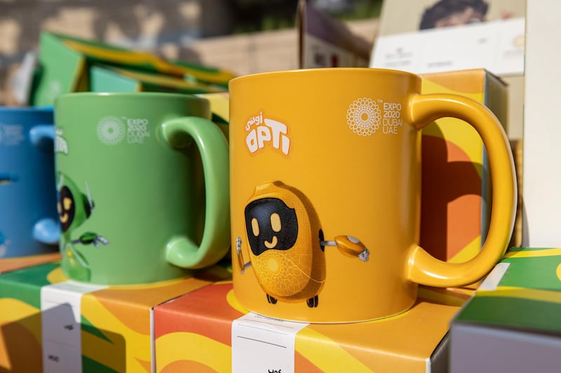 The Opti robot has its own Expo 2020 mug.