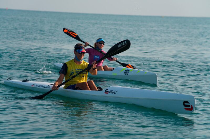 Kayakers race off the coast of Dubai. AP Photo