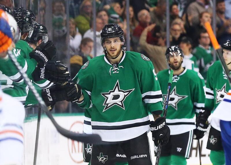 Tyler Seguin, centre, has shed some of his immaturity issues and has proved to be a natural leader on the ice for the Dallas Stars. Ronald Martinez/Getty Images/AFP