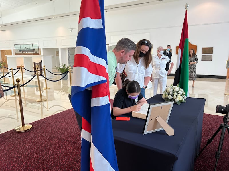Signing the book of condolence next to the Union Jack. Andrew Scott / The National