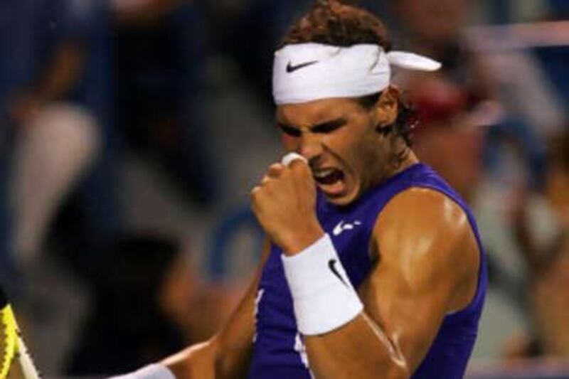 Rafael Nadal celebrates defeating Nicolas Lapentti in Cincinnati.