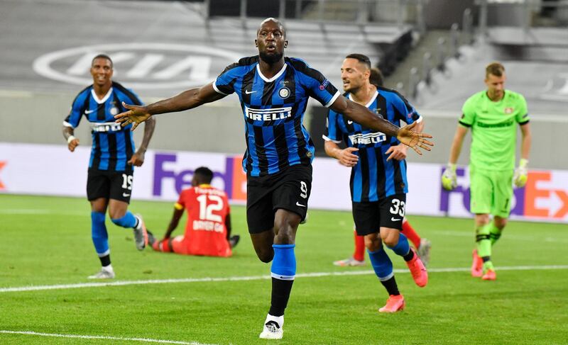 Inter Milan's Romelu Lukaku celebrates after scoring his side's second goal during the Europa League quarter finals soccer match between Inter Milan and Bayer Leverkusen at Duesseldorf Arena, in Duesseldorf, Germany, Monday, Aug. 10, 2020. (AP Photo/Martin Meissner)