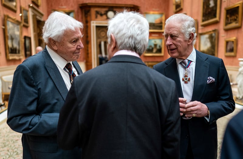 The monarch with David Attenborough during a lunch at Buckingham Palace. AFP