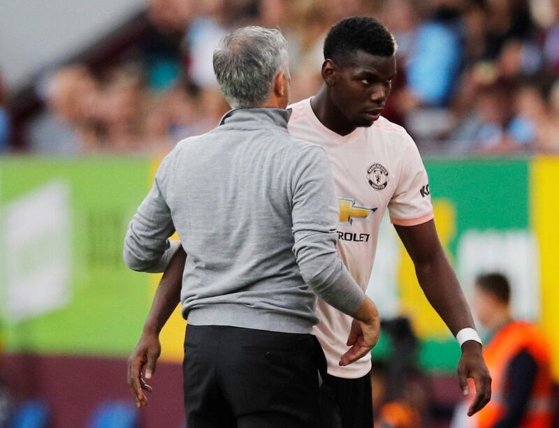 Soccer Football - Premier League - Burnley v Manchester United - Turf Moor, Burnley, Britain - September 2, 2018  Manchester United's Paul Pogba with manager Jose Mourinho after being substituted off  REUTERS/Phil Noble  EDITORIAL USE ONLY. No use with unauthorized audio, video, data, fixture lists, club/league logos or "live" services. Online in-match use limited to 75 images, no video emulation. No use in betting, games or single club/league/player publications.  Please contact your account representative for further details.