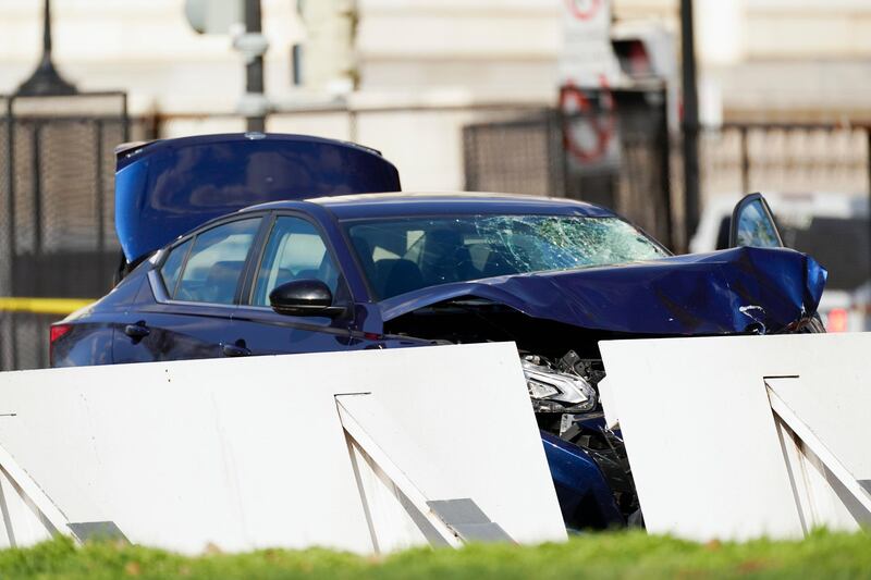 The car that crashed into a barrier on Capitol Hill viewed from the Senate side of the US Capitol. It struck two police officers, killing one. The second officer is in a stable condition. AP Photo