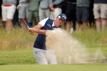 FILE PHOTO: Golf - The 149th Open Championship - Royal St George's, Sandwich, Britain - July 16, 2021 Phil Mickelson of the U. S.  plays out of a bunker on the 1st hole during the second round REUTERS / Lee Smith / File Photo
