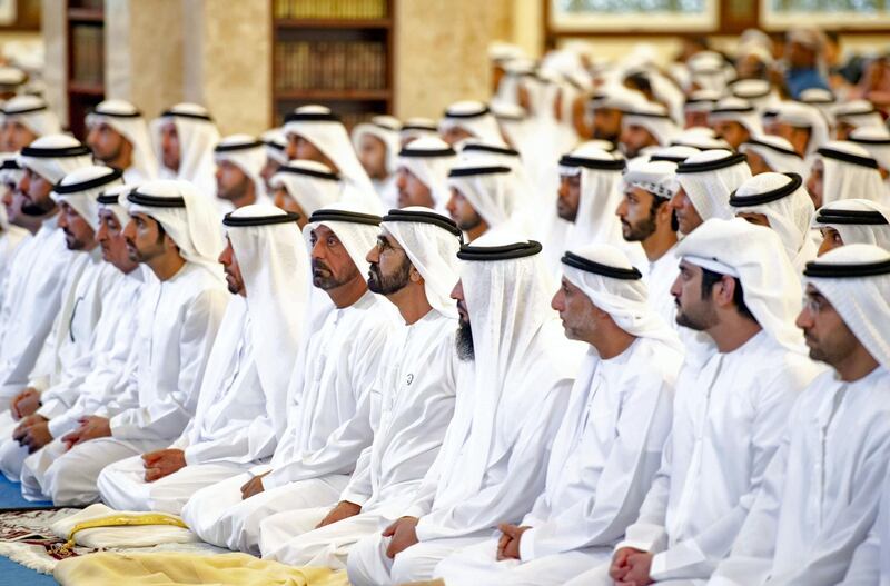 Sheikh Mohammed bin Rashid, members of the Royal Family and other dignitaries perform Eid Al Fitr prayer in Dubai. Also pictured is Sheikh Maktoum bin Mohammed, Deputy Ruler of Dubai, second from right, Sheikh Ahmed bin Saeed Al Maktoum, Chairman and Chief Executive of Emirates Airline and Group and Sheikh Hamdan bin Mohammed, Crown Prince of Dubai.