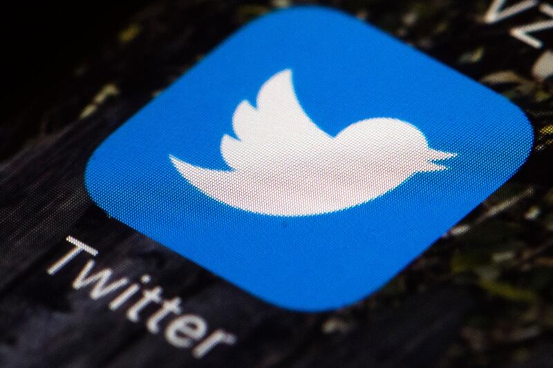 FILE - This April 26, 2017, file photo shows the Twitter app icon on a mobile phone in Philadelphia. Twitter says it mistakenly used the phone numbers and email addresses people provided for security purposes to show advertisements to its users. The company said Tuesday, Oct. 8, 2019, that it â€œinadvertentlyâ€ used the emails and phone numbers to let advertisers match people to their own marketing lists. (AP Photo/Matt Rourke, File)