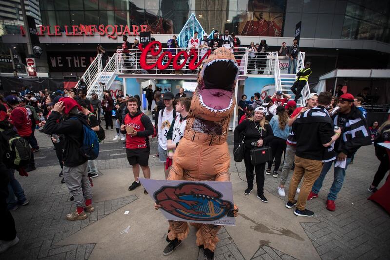Toronto Raptors fans cheer outside Scotiabank Arena, at what's dubbed "Jurassic Park," before Game 1 of the NBA Finals between the Golden State Warriors and the Raptors in Toronto. AP Photo