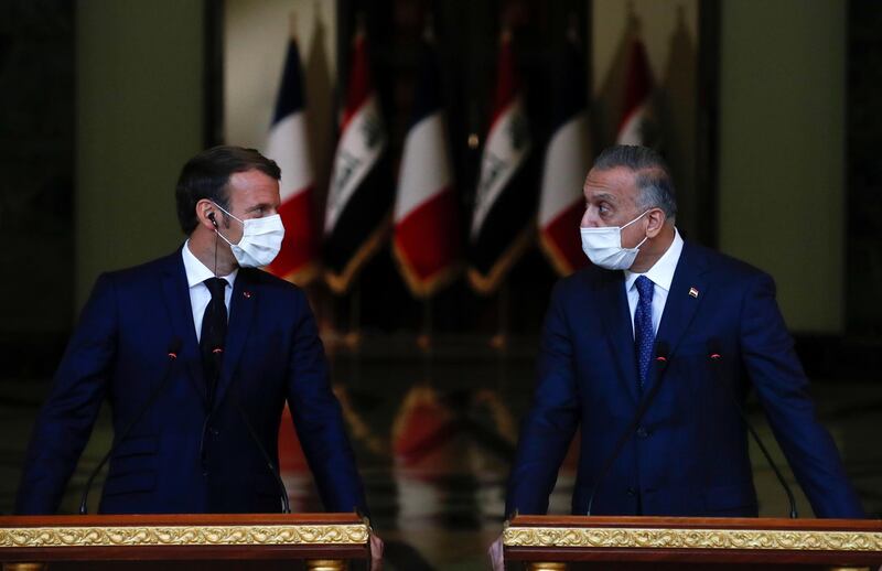 French President Emmanuel Macron and Iraqi Prime Minister Mustafa Al Kadhimi react during a news conference  after a meeting, in Baghdad, Iraq.  EPA