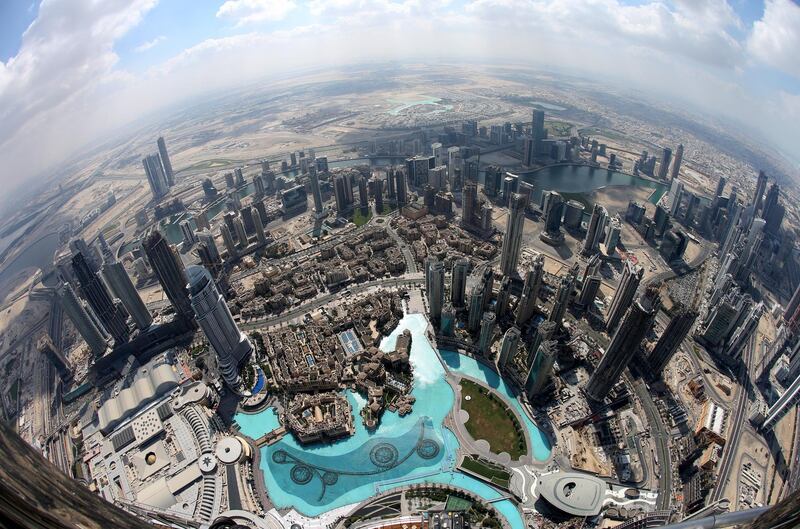 epa07367641 A picture taken with a fisheye lens shows areas close to the world's tallest building Burj Khalifa as seen from the the new highest lounge in the world at Burj Khalifa in Dubai, United Arab Emirates, 13 February 2019. Ahmad Al Falasi, Executive Director Emaar Properties announced during media briefing the opening of highest lounge in the world at Burj Khalifa located on the 152, 153, and 154 floors at 575 metres, with each have its distinctive settings assuring never before seen views of the city.  EPA/ALI HAIDER