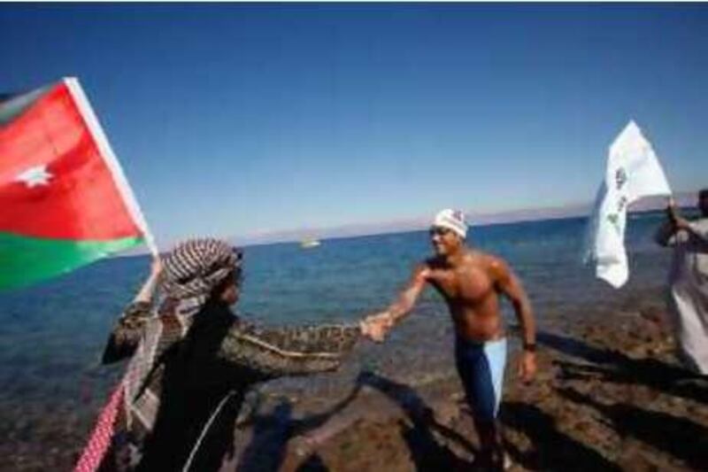 Marcos Diaz, the Domenican Republic Ultra Distance Open Water swimmer swims for 8 kilometers in 5 hours from  Coral Bay in Aqaba, Jordan to Taba in Egypt on June 10, 2010 promoting the achievement of the MDGs (Millenium Development Goals), in his quest to unite the Five Continents and demonstrate that everyone can positively contribute towards change and the achievement of the MDGs. (Salah Malkawi for The National)