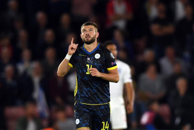epa07833561 Kosovo's Valon Berisha celebrates after scoring after 35 seconds against England. AFP