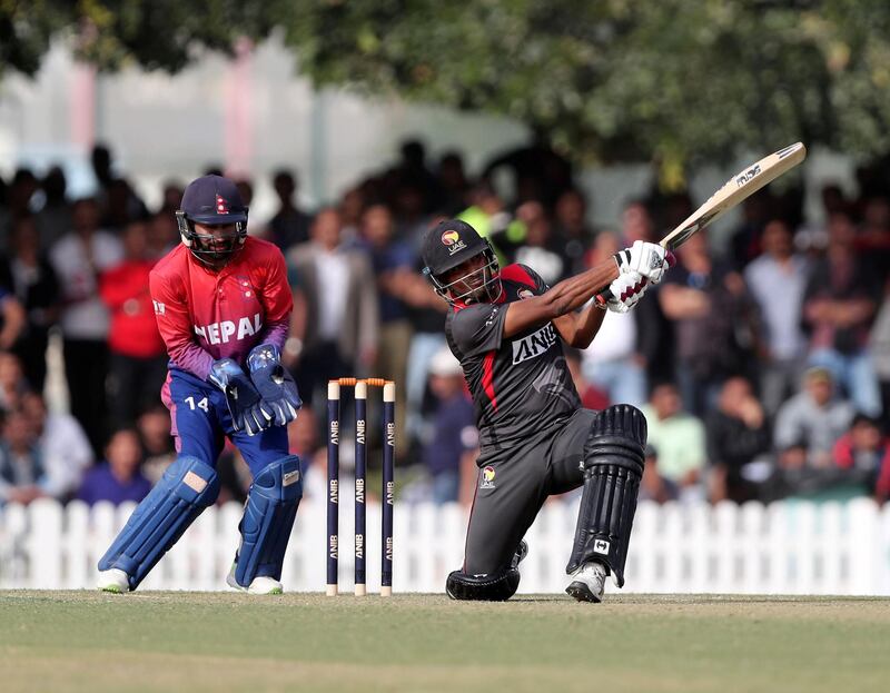 Dubai, United Arab Emirates - January 25, 2019: Amir Hayat of the UAE bats in the the match between the UAE and Nepal in a one day internationl. Friday, January 25th, 2019 at ICC, Dubai. Chris Whiteoak/The National