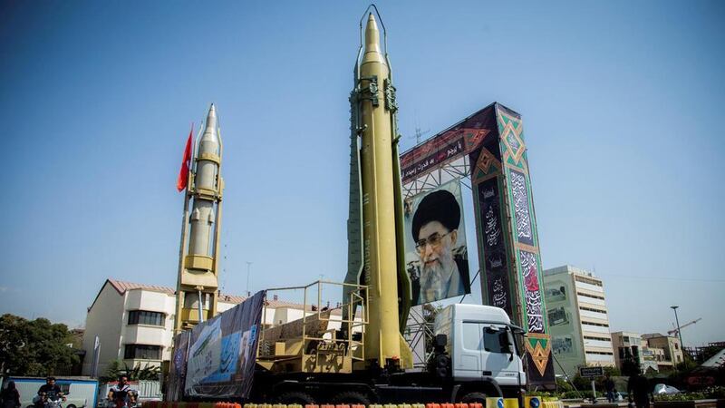 A display featuring missiles and a portrait of Iran's Supreme Leader Ayatollah Ali Khamenei is seen at Baharestan Square in Tehran, Iran. (Reuters)