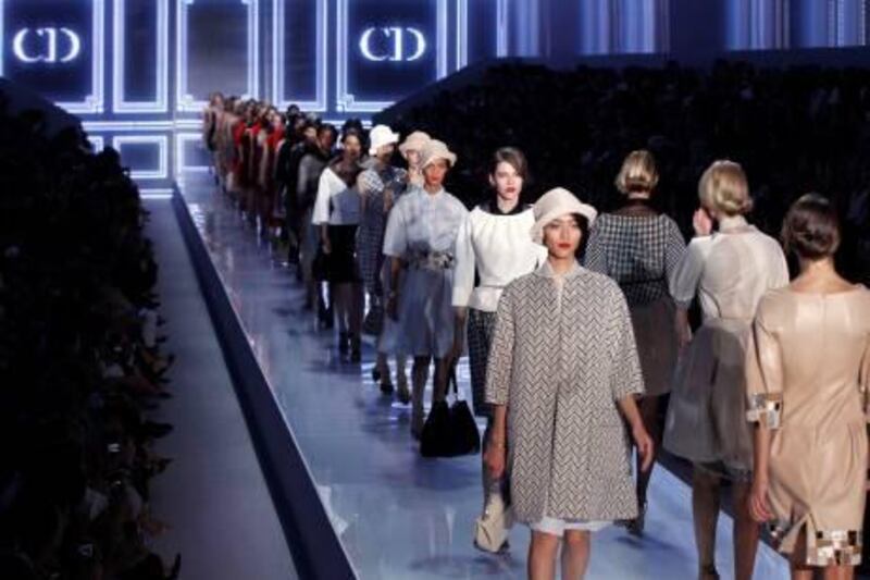 Models present creations by British-born designer Bill Gaytten for Christian Dior during the Spring/Summer 2012 ready-to-wear collection show, on September 30, 2011 in Paris. AFP PHOTO/FRANCOIS GUILLOT
 *** Local Caption ***  950643-01-08.jpg