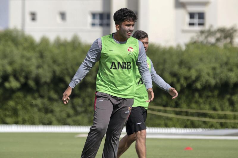 SHARJAH, UNITED ARAB EMIRATES. 31 DECEMBER 2019. The UAE U19 cricket team training at the ICC Academy in Sports City ahead of their trip to the World Cup in South Africa. Player Alishan Sharafu in the green vest. (Photo: Antonie Robertson/The National) Journalist: Paul Radley. Section: National.

