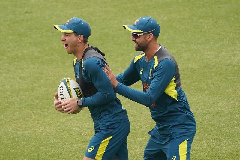 SYDNEY, AUSTRALIA - JANUARY 01: Tim Paine of Australia is tackled by Nathan Lyon of Australia in a rugby session during an Australian Test team training session at the Sydney Cricket Ground on January 01, 2020 in Sydney, Australia. (Photo by Mark Evans/Getty Images)