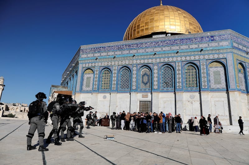 Israeli security forces take their positions during clashes with Palestinian protesters. Reuters