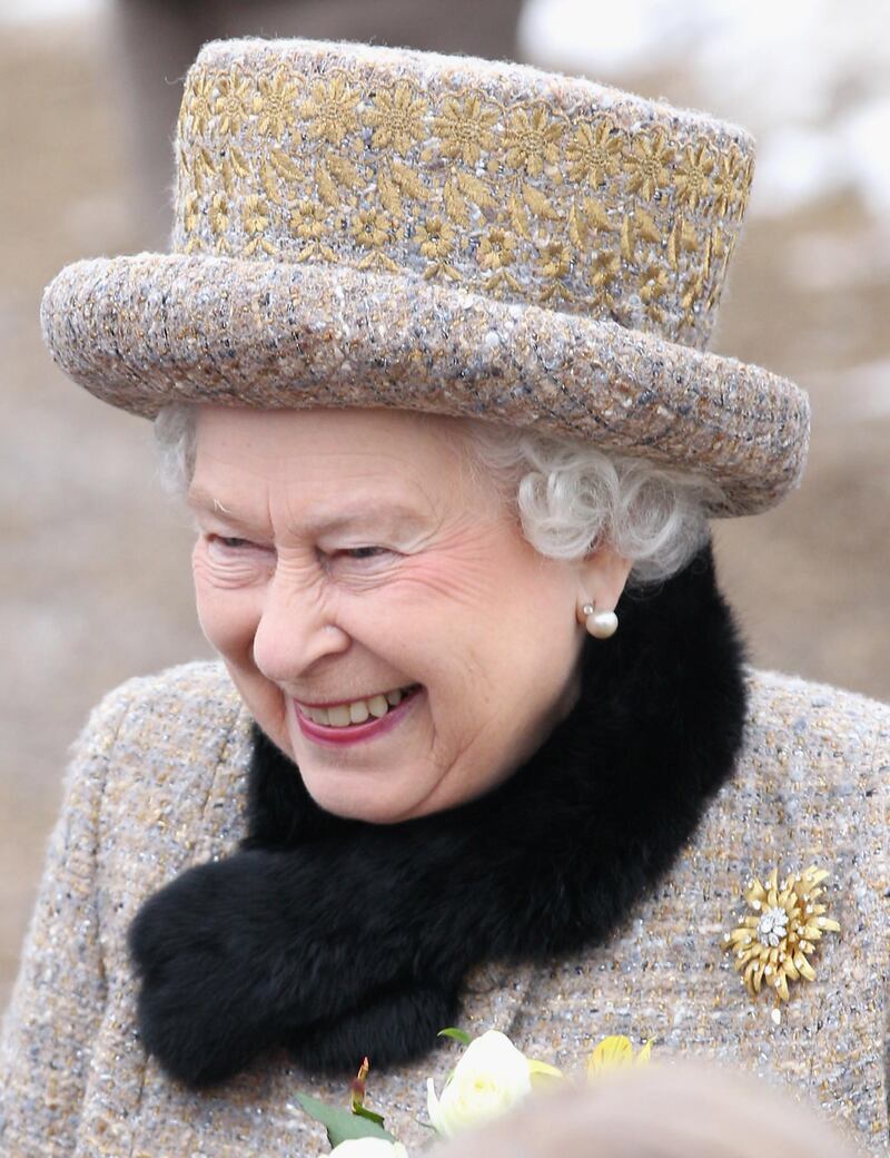(FILES) In this file photo taken on February 5, 2012 Queen Elizabeth II smiles as she leaves the Sunday Service at West Newton Church. The animal rights organization Humane Society International UK welcomed November 4, 2019, that Queen Elizabeth II "officially" abandoned the wearing of fur, citing her official dressmaker. / AFP / POOL / Chris Jackson
