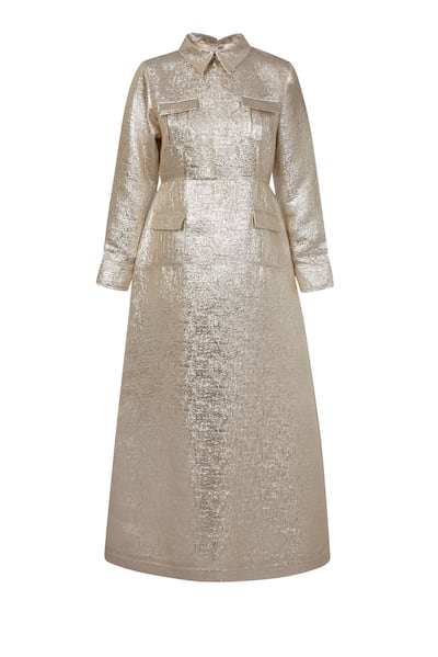 An antique silver dress by Serrb