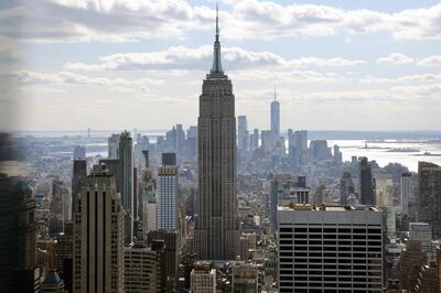 NEW YORK, NEW YORK - MARCH 04: The Empire State Building towers above other largely empty office buildings on March 04, 2021 in New York City. According to Colliers International, in January the office available rate in Manhattan rose to 14.9%, which is the highest level on record dating back to 2000. Some companies are slowly asking employees to return to the office while other's are waiting for more New Yorkers to receive the vaccine for Covid-19.   Spencer Platt/Getty Images/AFP (Photo by SPENCER PLATT / GETTY IMAGES NORTH AMERICA / Getty Images via AFP)