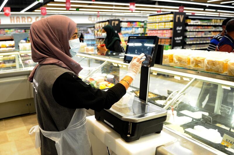 In line with Covid-19 safety and protocols, the store only permits entry with those who have downloaded the Tawakkalna app. AFP