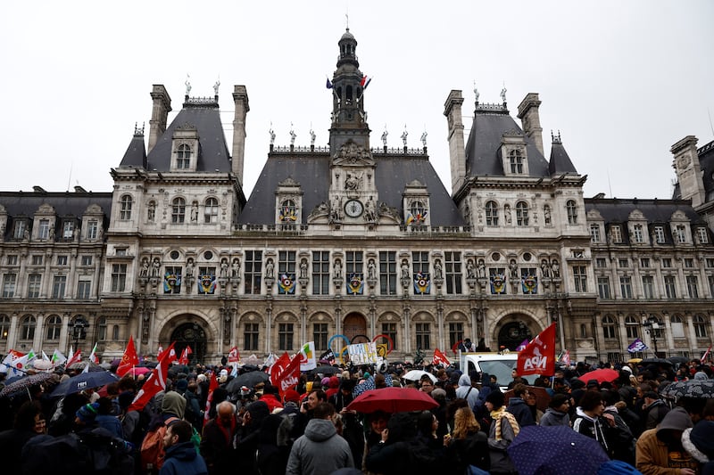 Protesters gather in front of the Paris City Hall after the Constitutional Council approved most of the French government's pension reform, on Friday.  Reuters