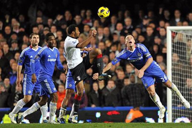 Chelsea's defender John Terry, right, vies with Fulham's striker Moussa Dembele, 2nd right.