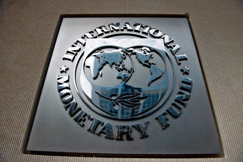 (FILES) In this file photo taken on June 30, 2015 a logo is seen outside the headquarters of the International Monetary Fund in Washington, DC.  The International Monetary Fund on July 3, 2019 approved a $6 billion, three-year loan for Pakistan to try to right the South Asian nation's economy. With the IMF board's approval, the fund released $1 billion to Pakistan immediately and said in a statement the program aims to "support the authorities' economic reform program" and to help "reduce economic vulnerabilities and generate sustainable and balanced growth."
 / AFP / Brendan SMIALOWSKI
