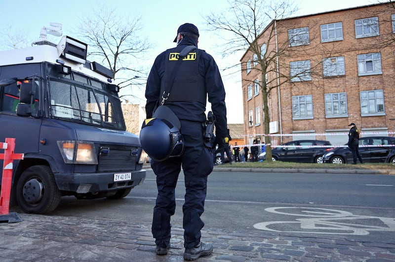 A police officer outside the mosque. AFP