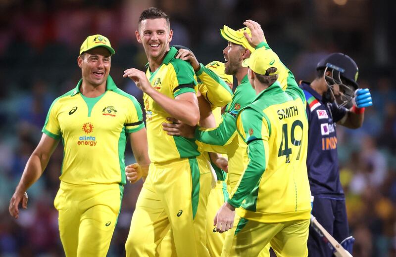 Australia’s Josh Hazlewood celebrates with teammates after taking the wicket of India’s Shreyas Iyer at the Sydney Cricket Ground. AFP