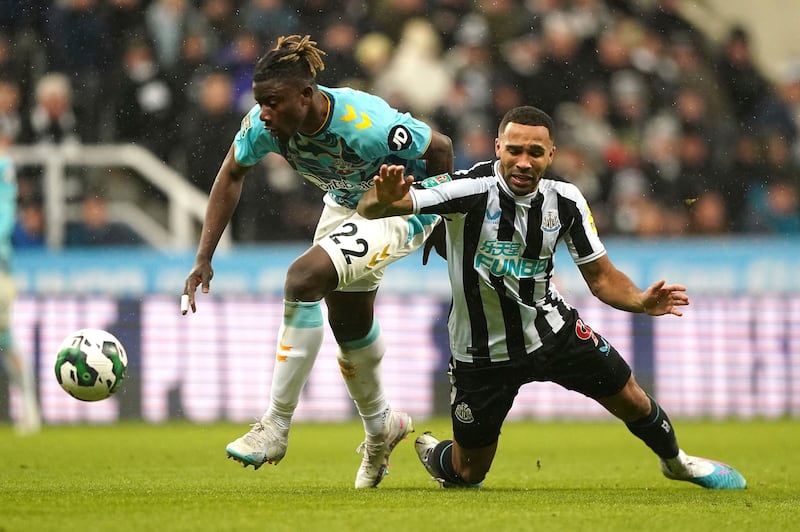 Southampton's Mohammed Salisu and Newcastle's Callum Wilson battle for the ball. PA