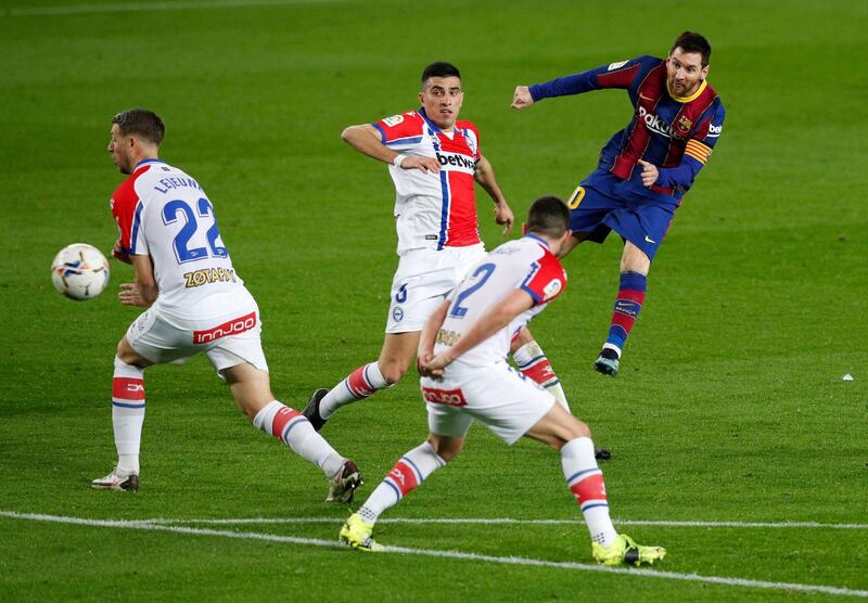 Barcelona's Lionel Messi scores their second goal. Reuters