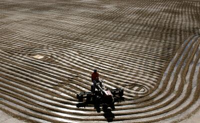 A worker dries Arabica coffee beans at the Conquista farm in the southern Brazilian city of Minas Gerais. Reuters