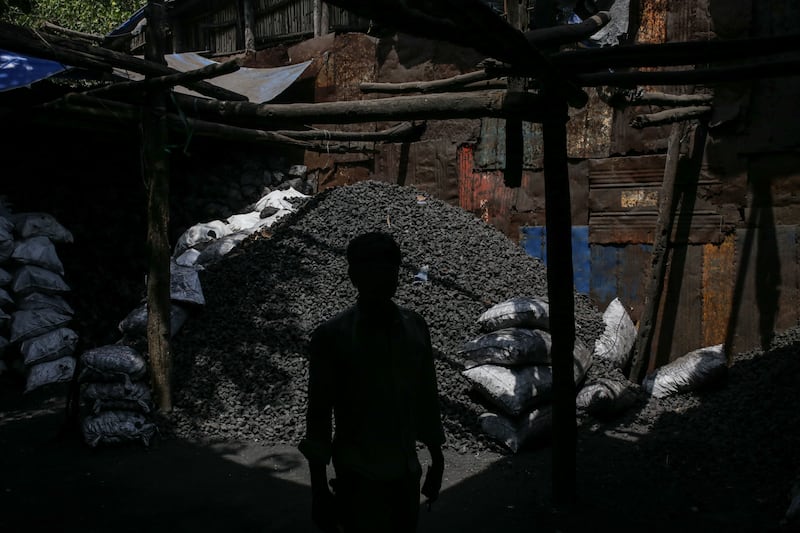 A coal wholesale market in Mumbai. India expects power demand to hit a peak of 229 gigawatts next month. Bloomberg