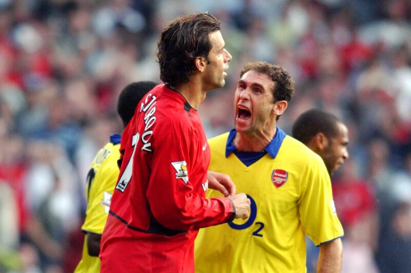 Arsenal's Martin Keown lets Manchester United's Ruud van Nistelrooy know how he feels after van Nistelrooy missed a penalty  (Photo by Neal Simpson/EMPICS via Getty Images)