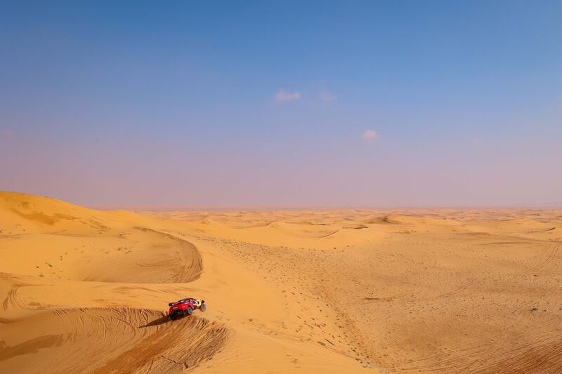 Sebastien Loeb tops a dune in the Bahrain Raid Xtreme race.