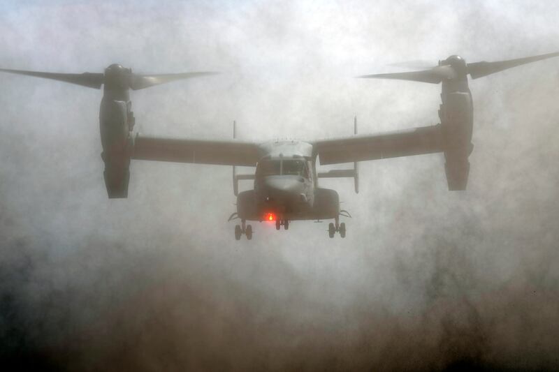 An MV-22 Osprey participates during a joint military helicopter borne operation drill between Japan Ground Self-Defense Force (JGSDF) and U. S.  Marines at Higashi Fuji range in Gotemba, southwest of Tokyo, Tuesday, March 15, 2022.  (AP Photo / Eugene Hoshiko)
