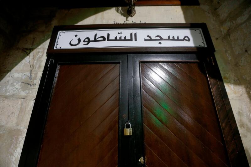A closed door after the last prayer at Al-Satoun Mosque in the Old City of Nablus. The Palestinian Authority closed all mosques and churches in the West Bank and asked Palestinians to pray at home to prevent the spread of the coronavirus. EPA