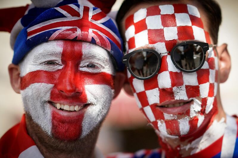 An England and a Croatian football fan pose in Red Square ahead of the World Cup semi-final game between England and Croatia in Moscow, Russia, on July 11, 2018. Getty Images