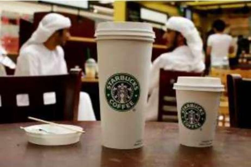 Abu Dhabi - 11th August ,  2008 -Starbucks cups in the Starbucks at Marina Mall  ( Andrew Parsons  /  The National ) *** Local Caption ***  ap001-1108-starbucks.jpgap001-1108-starbucks_2.jpg