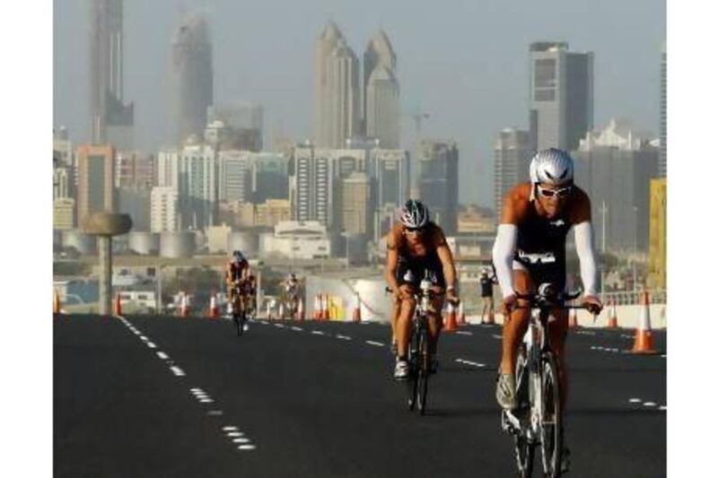 A reader says the aid stations for the Abu Dhabi Triathlon must be set up at a safer location. Mike Young / The National