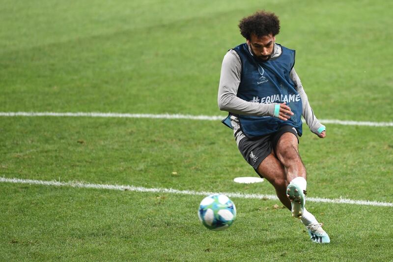 Liverpool's Egyptian midfielder Mohamed Salah kicks the ball during a training session ahead of the UEFA Super Cup 2019 match between Liverpool and Chelsea at Besiktas Park stadium in Istanbul. AFP