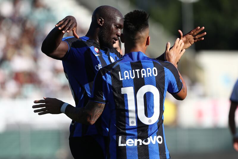 Romelu Lukaku celebrates with Lautaro Martinez after the Inter Milan No 10 scored in a pre-season friendly against FC Lugano on July 12, 2022. Getty