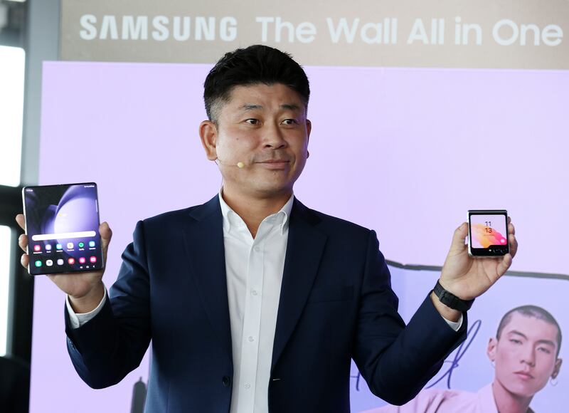 DooHee Lee, president of Samsung Gulf Electronics, unveiling the Galaxy Z Fold5 and Flip5 in Dubai on Thursday. Chris Whiteoak / The National